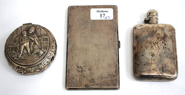 Appraisal: A SILVER CIGARETTE CASE with engine turned decoration cm wide