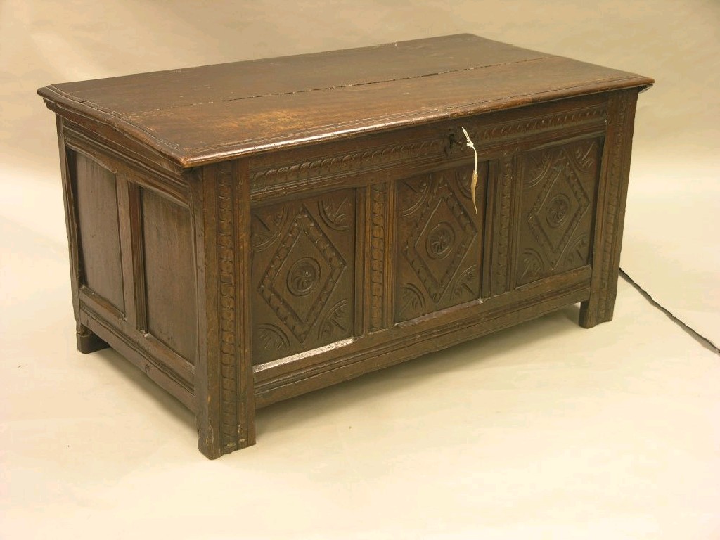 Appraisal: An early th century oak coffer interior with candle-tray the