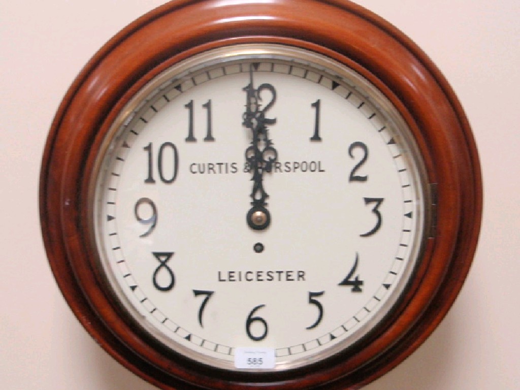 Appraisal: A late Victorian mahogany cased wall clock with circular painted