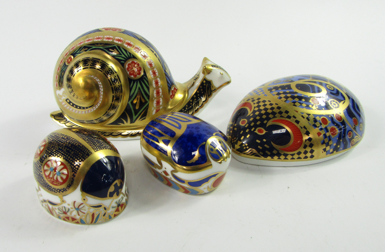 Appraisal: Four Royal Crown Derby Imari pattern paperweights comprising garden snail