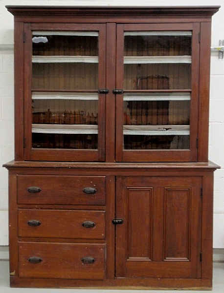 Appraisal: Pine two-piece butler s pantry cupboard late th c with