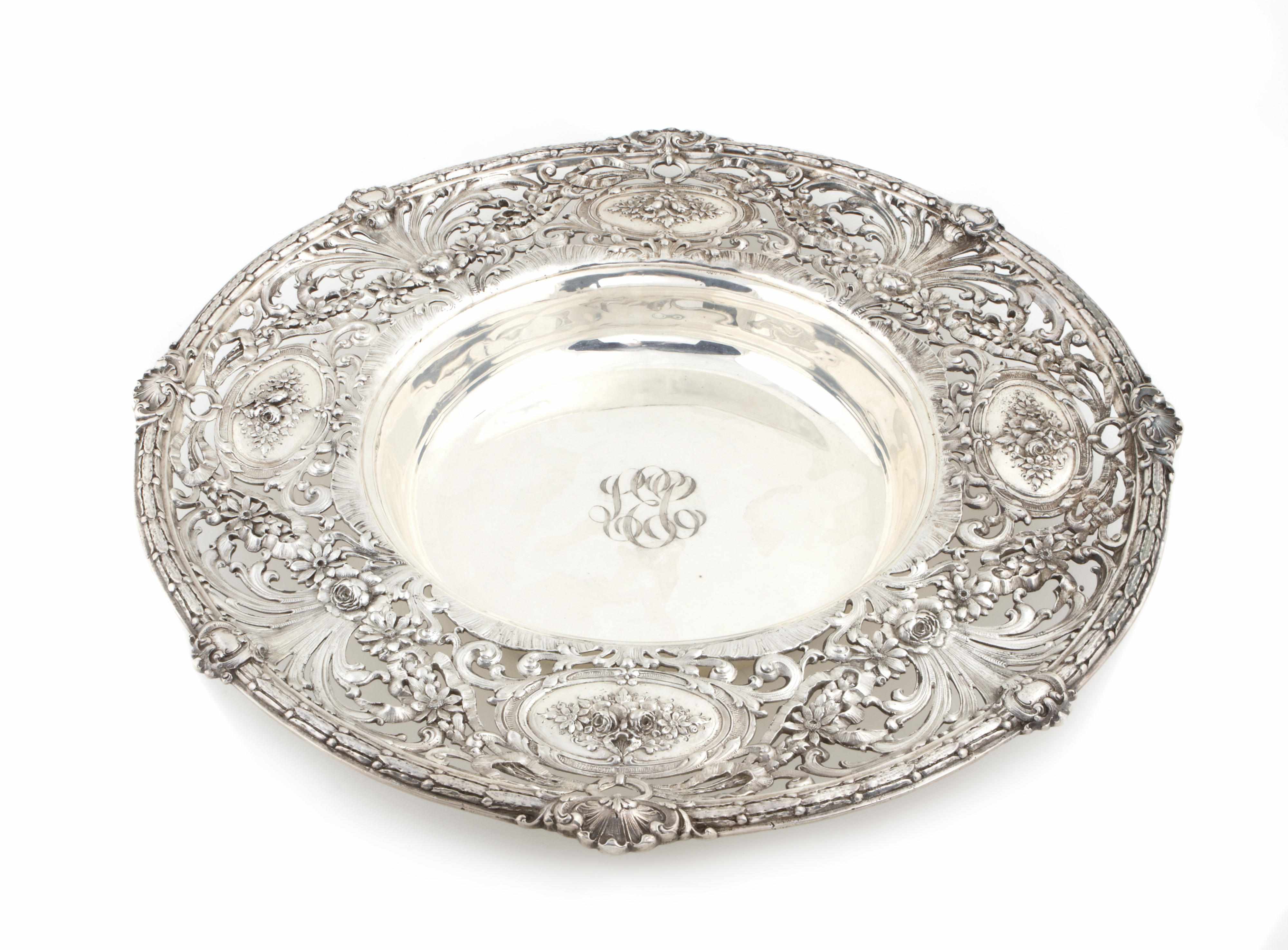 Appraisal: A sterling centerpiece bowl with applied cast border Redlich and