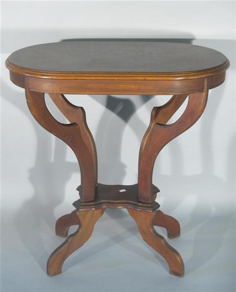 Appraisal: VICTORIAN STYLE MAHOGANY OVAL TABLE The oval top with molded