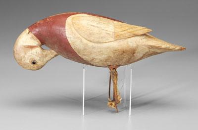 Appraisal: Carved and painted wooden duck in preening posture glass eyes