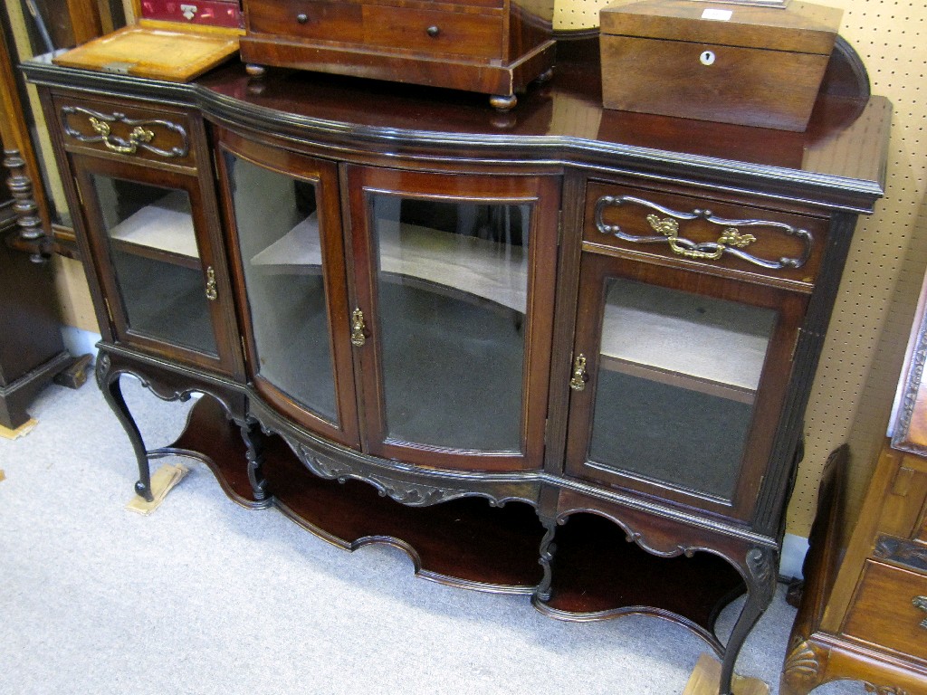 Appraisal: Victorian mahogany bow fronted and glazed door display sideboard base