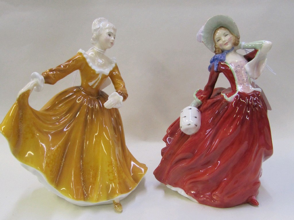 Appraisal: Two Royal Doulton figures 'Autumn Breezes' HN and 'Kirsty' HN