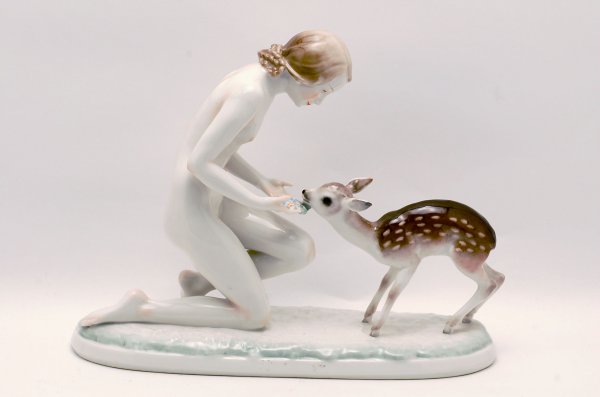 Appraisal: Hutschenreuther figure of nude kneeling girl and fawn titled under