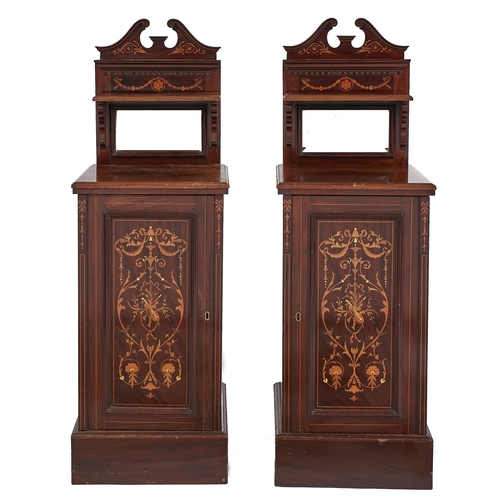 Appraisal: A pair of Edwardian mahogany and inlaid pedestal pot cupboards