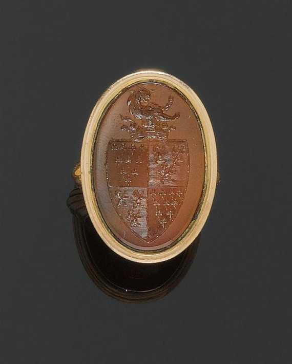 Appraisal: CARNEOLE AND GOLD RING th th century Pink gold Attractive