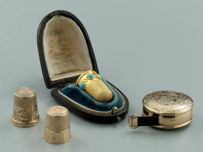 Appraisal: kt gold sewing items cased thimble with blue stones x