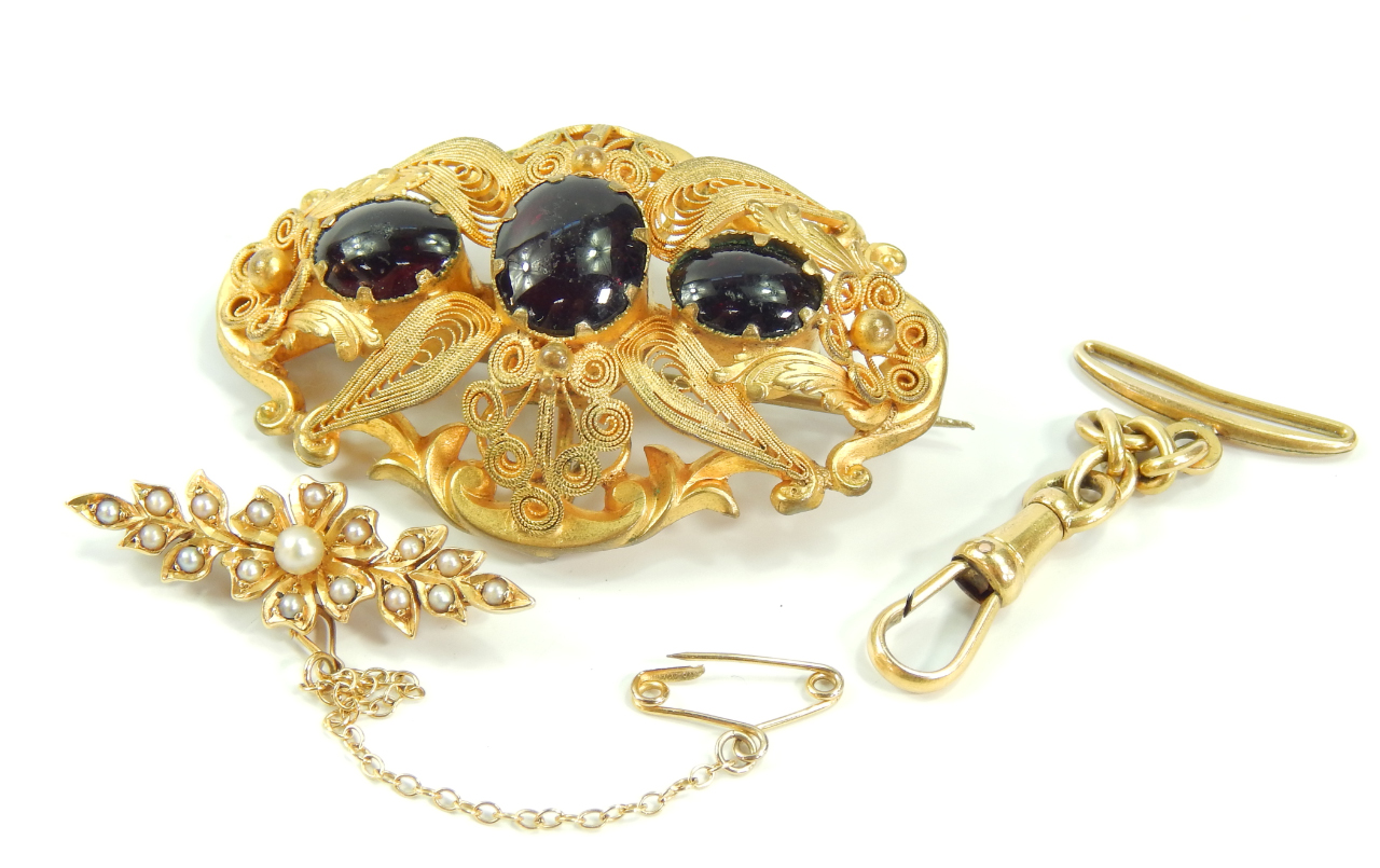 Appraisal: A yellow metal and seed pearl floral brooch on a