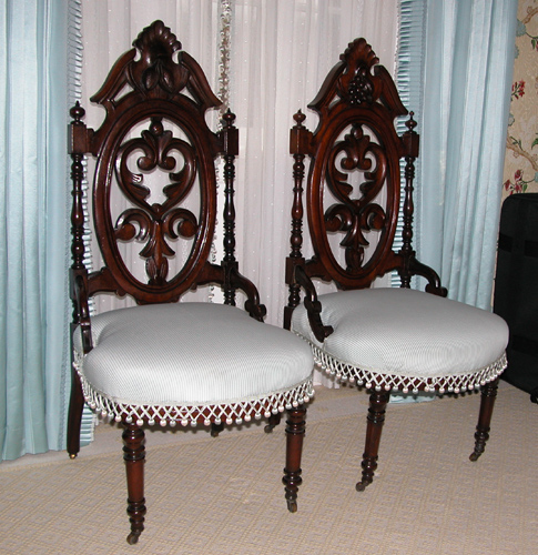 Appraisal: Pair of Mid-Victorian Rococo Style Walnut Carved Parlor Chairs with