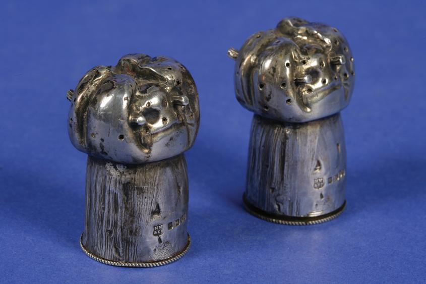 Appraisal: A PAIR OF VICTORIAN NOVELTY PEPPERS in the form of