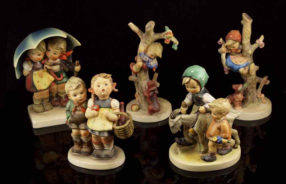 Appraisal: COLLECTION OF HUMMEL FIGURINES To include STORMY WEATHER TM ''h