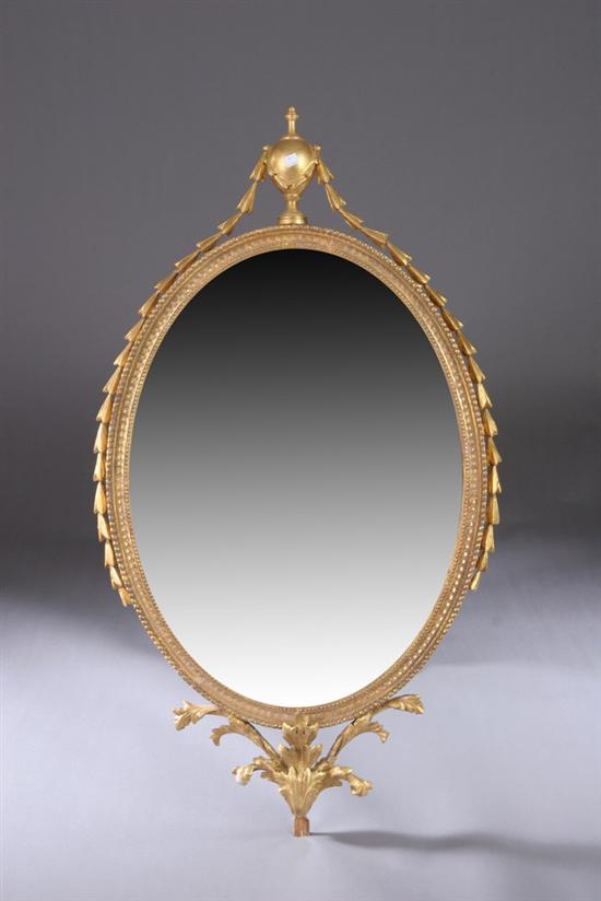 Appraisal: NEOCLASSICAL STYLE GILTWOOD OVAL MIRROR th century Ball-turned finial with