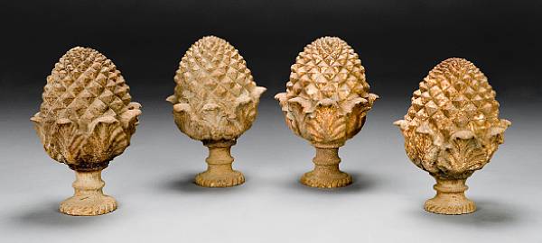 Appraisal: A set of four cast iron pine cone finials Each