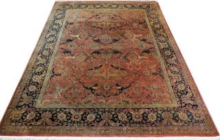 Appraisal: INDO-PERSIAN CARPET W ' L ' A burnt red-orange ground