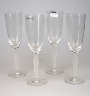 Appraisal: Four Lalique champagne flutes having frosted stems incised to base