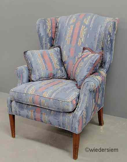 Appraisal: Chippendale style wing chair with molded front legs ''h x