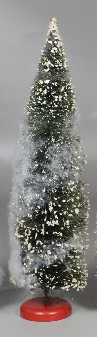 Appraisal: Large green bottle brush Christmas tree with snow h