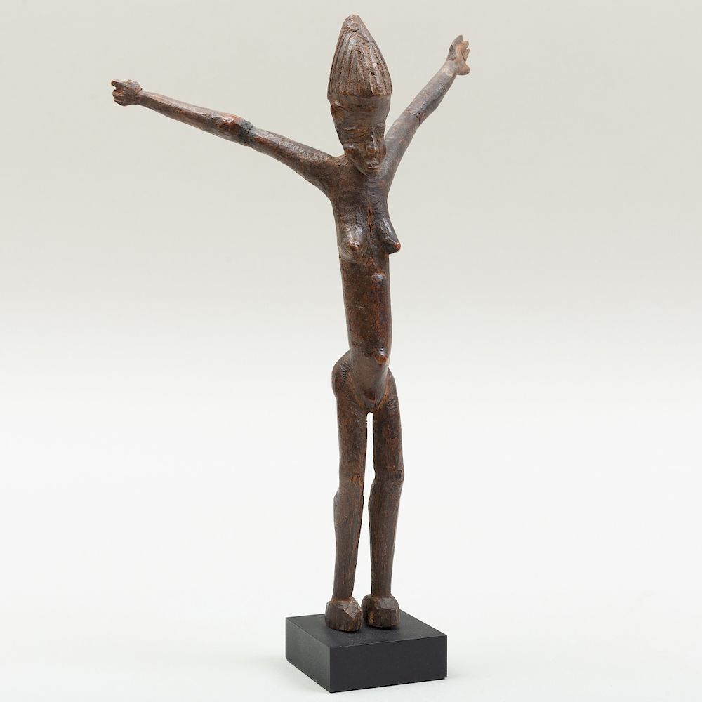 Appraisal: Lobi Wood Standing Female Figure Burkina Faso Now raised on