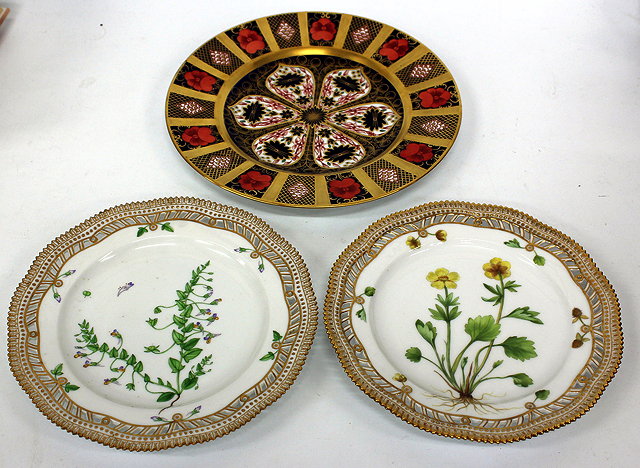 Appraisal: A PAIR OF ROYAL COPENHAGEN CABINET PLATES hand painted with