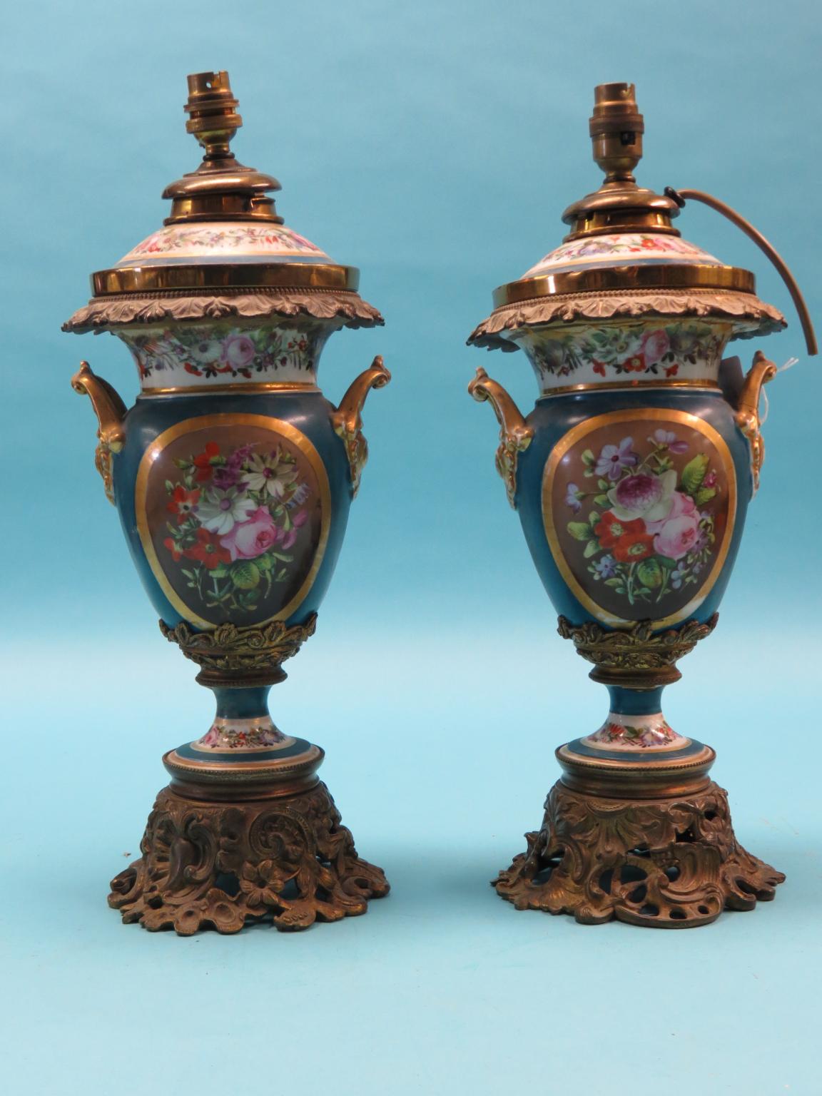 Appraisal: A pair of th century French porcelain and ormolu oil