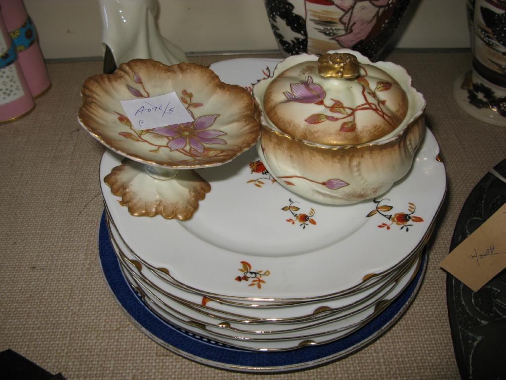 Appraisal: A set of seven Meissen dinner plates enamelled decoration in