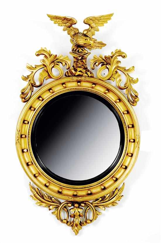 Appraisal: Giltwood convex mirror late th century in the Regency style