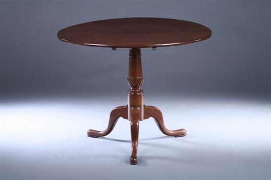 Appraisal: QUEEN ANNE MAHOGANY PEDESTAL-BASE TEA TABLE th century Round tilt-top