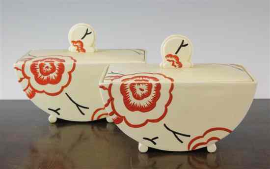 Appraisal: A pair of Clarice Cliff Biarritz shape tureens and covers