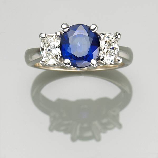 Appraisal: A sapphire and eighteen karat gold diamond three stone ring