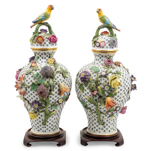 Appraisal: A Pair of Continental Porcelain Covered Urns th Century Height