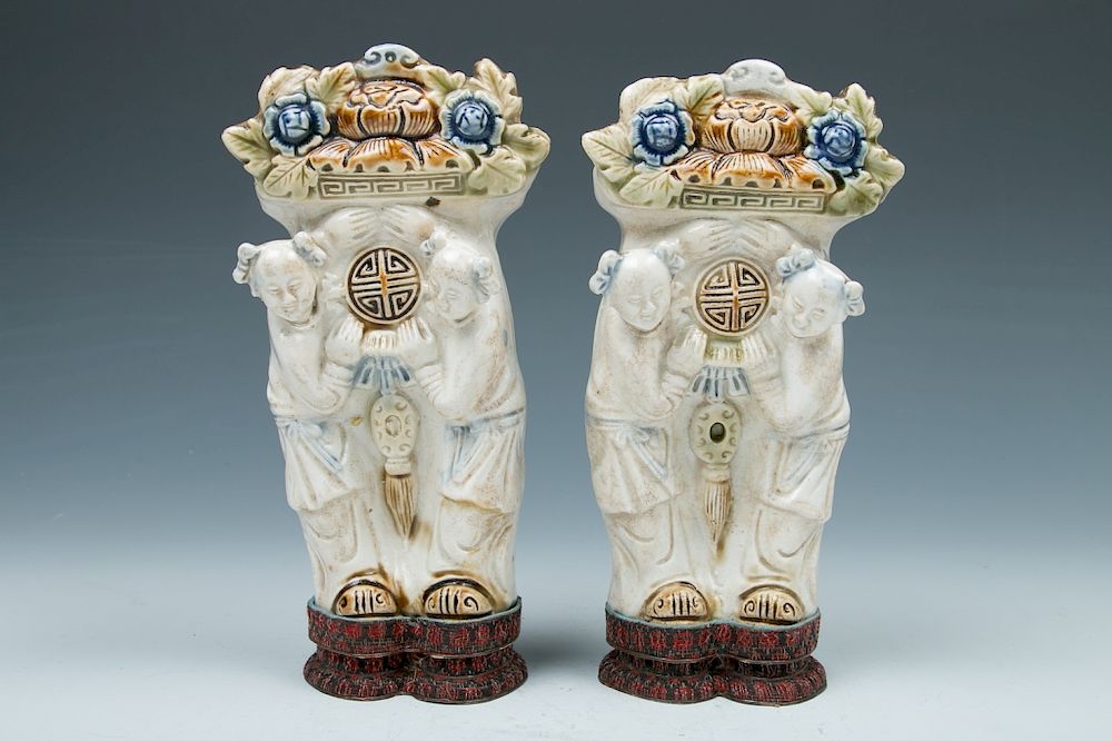 Appraisal: PAIR OF SANCAI 'FIGURAL' WALL VASES Each vase decorated with