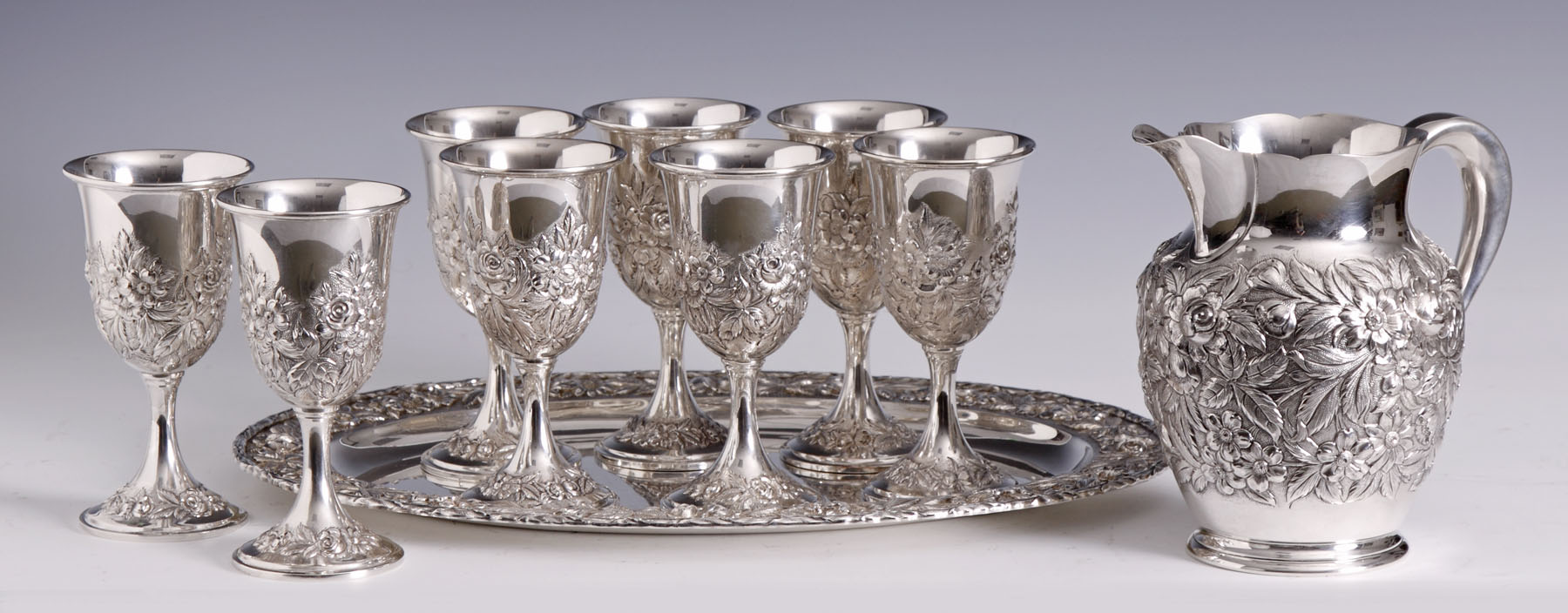 Appraisal: S Kirk son Baltimore Sterling Pitcher Oval Tray Goblets Repousse