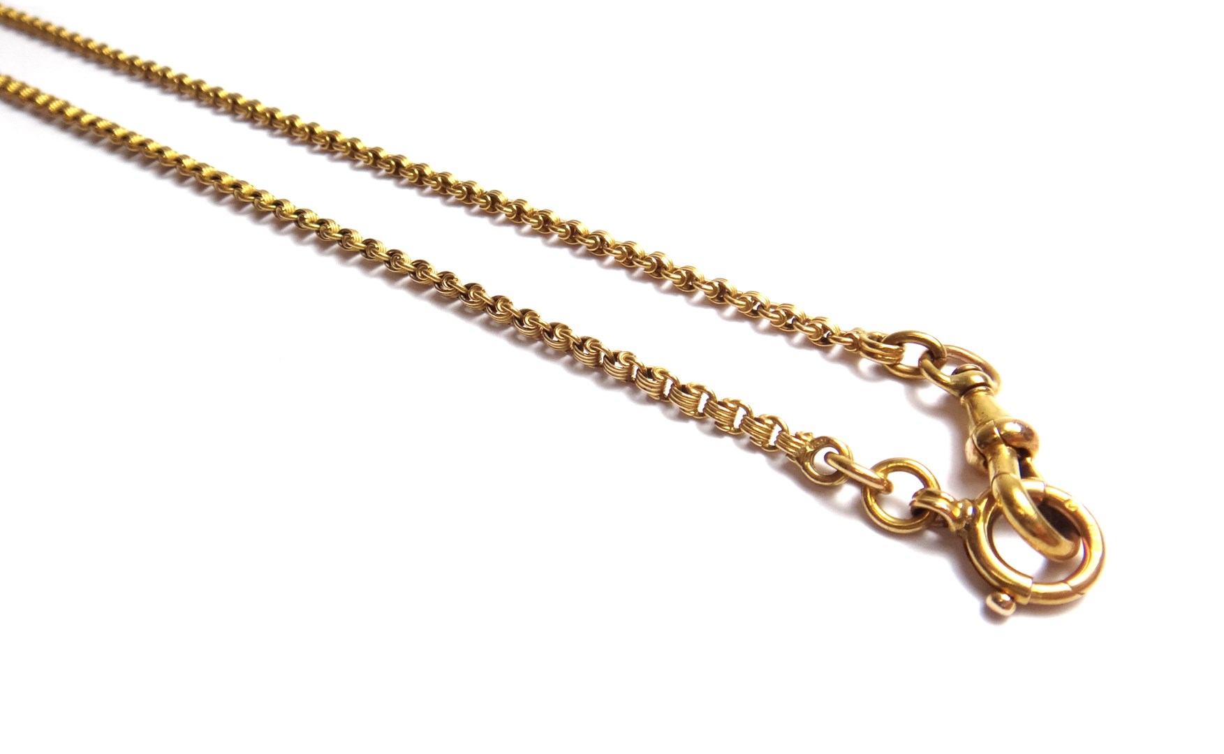 Appraisal: A gold long guard chain in an oval and wirework