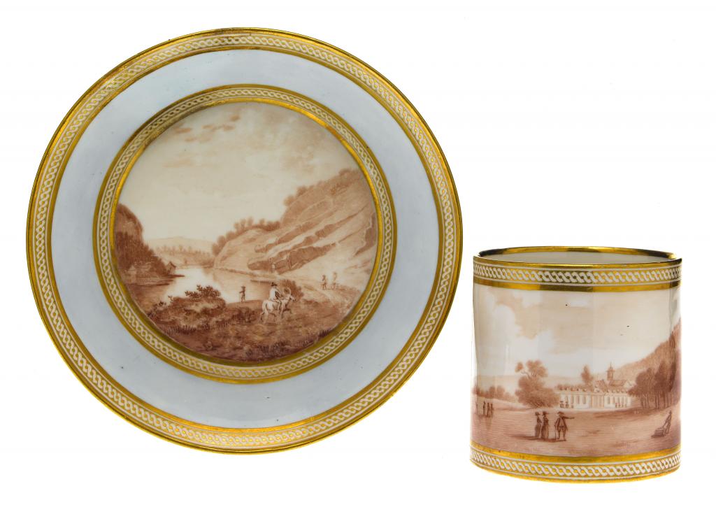 Appraisal: A DERBY COFFEE CAN AND SAUCER painted en camaieu by