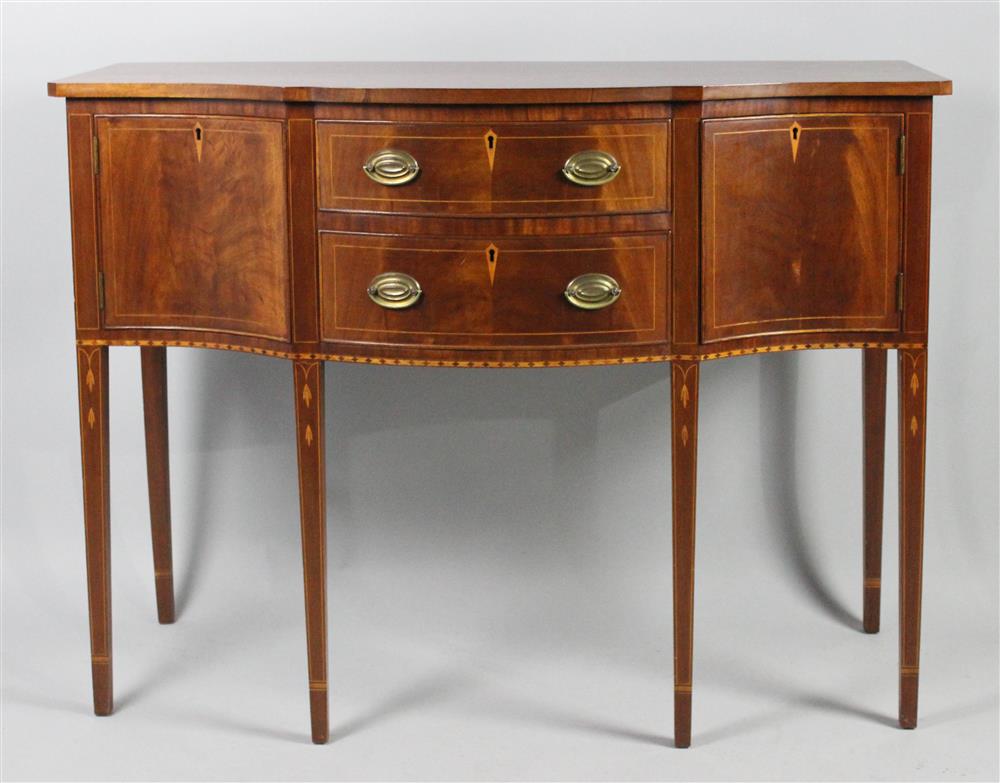 Appraisal: HEPPLEWHITE STYLE MAHOGANY SIDEBOARD having a shaped top with canted