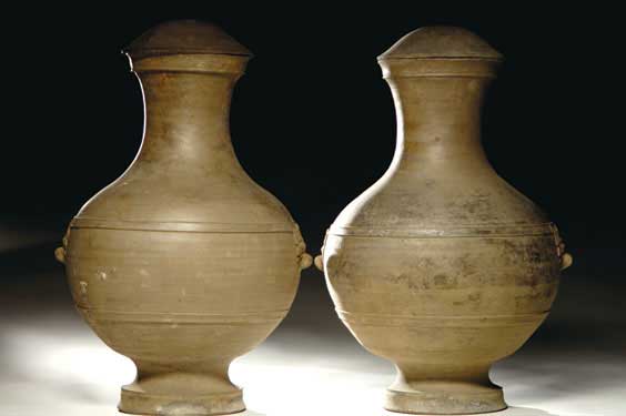 Appraisal: PAIR MASSIVE HAN POTTERY JARS Pair of massive Chinese Han