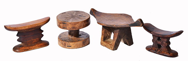 Appraisal: A DOGON CARVED WOODEN STOOL with circular top and base