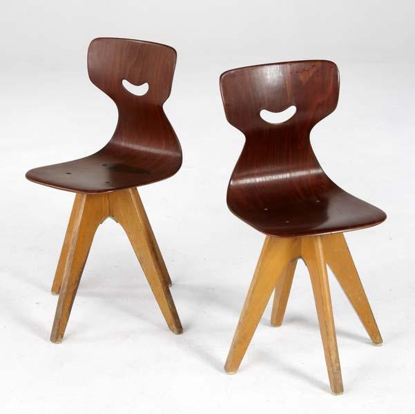 Appraisal: PAGHOLZ Austrian Pair of bentwood child s chairs with cut-out