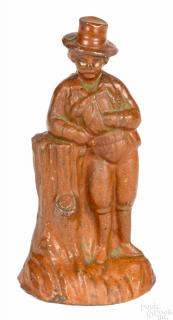 Appraisal: Pennsylvania or Maryland redware figure of a gentleman leaning on