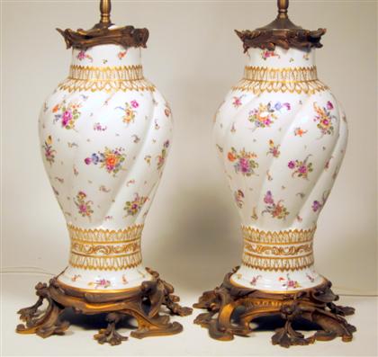 Appraisal: Pair of Meissen style gilt metal mounted hand-painted porcelain lamps