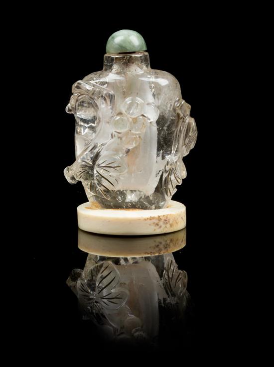 Appraisal: Sale Lot A Carved Rock Crystal Snuff Bottle depicting a