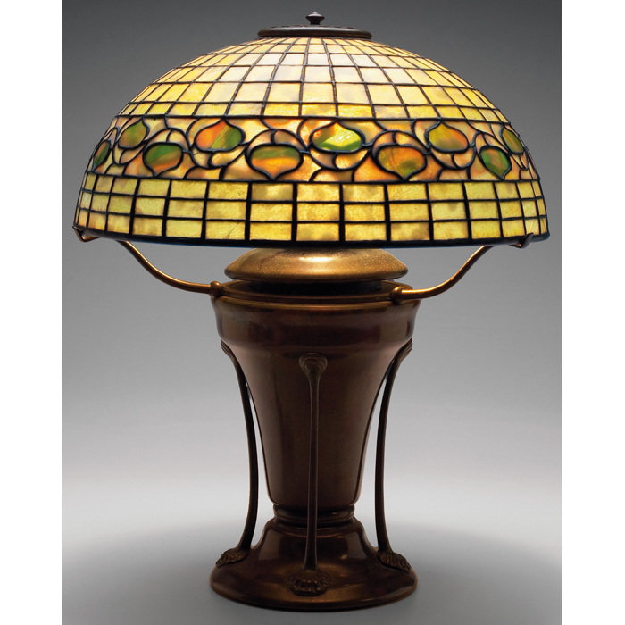 Appraisal: Exceptional Tiffany Studios table lamp unusual bronze base with a