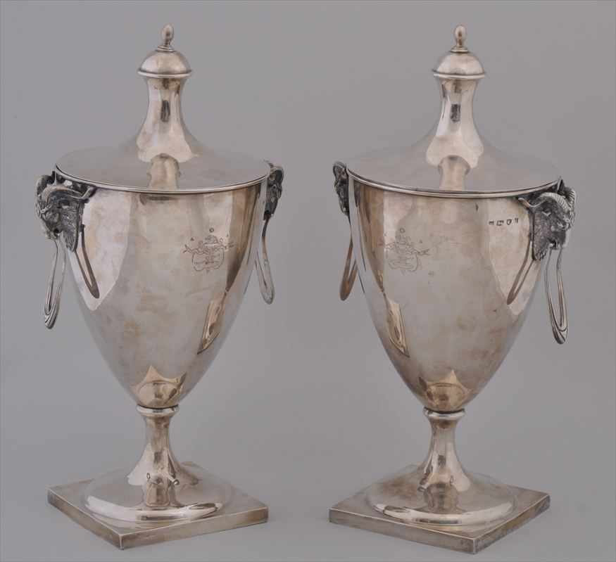 Appraisal: PAIR OF GEORGE III STYLE SILVER URNS AND COVERS WITH