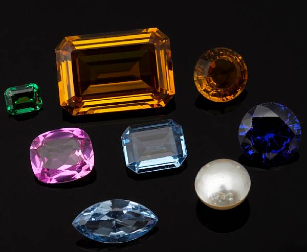 Appraisal: A collection of mixed synthetic shell and miscellaneous gemstones