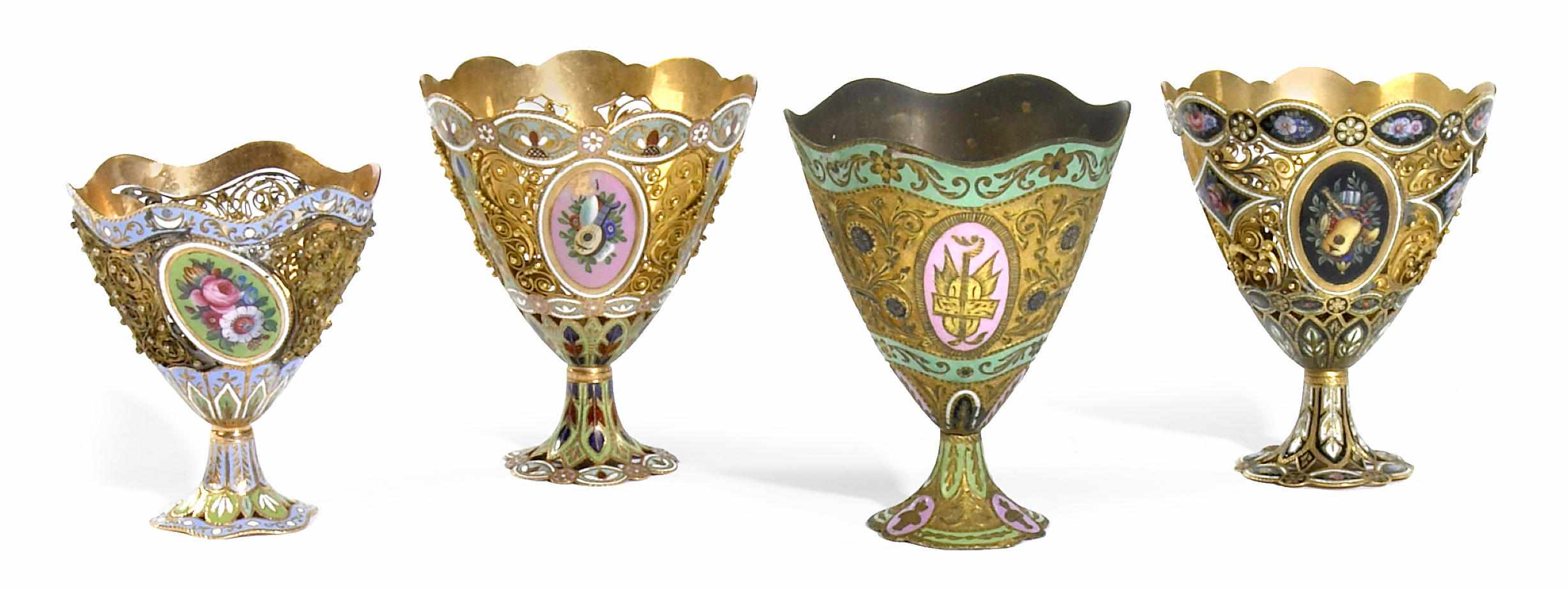 Appraisal: A group of three gold gilt metal and enamel zarfs