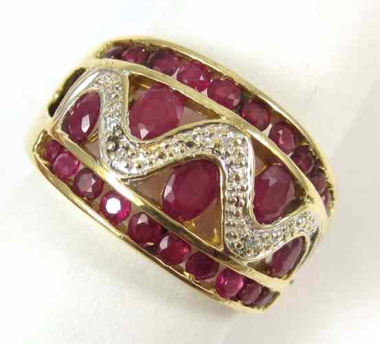 Appraisal: RUBY DIAMOND AND TEN KARAT GOLD RING set with five