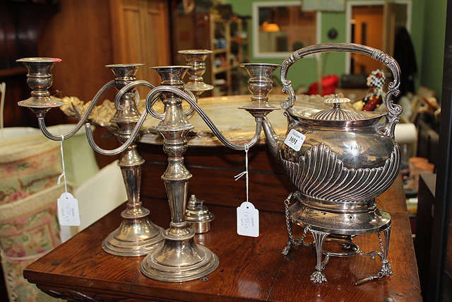 Appraisal: A VICTORIAN SILVER PLATED TEA KETTLE AND STAND together with